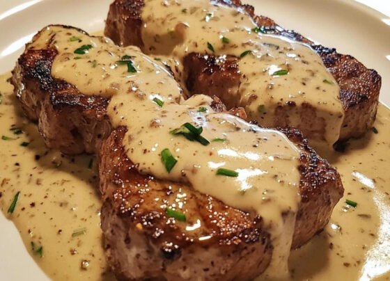 RECIPE NAME: Steak with Ghostly Bourbon Garlic Cream Sauce prepared at home with simple ingredients and clear steps.